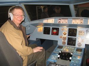 If there is an airplane nearby, I just have to sit in the pilot's seat!  This is a mockup of the cockpit of an airbus.