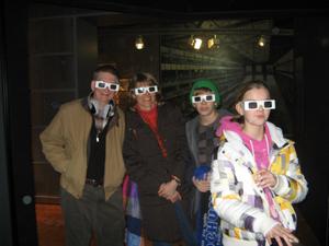 Watching a 3-D movie.  From left to right, Charles, Beatrix, Niels and Benita.