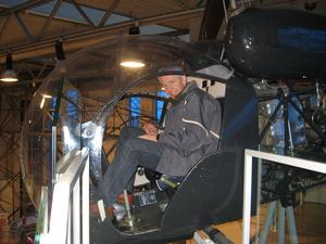Peter is enjoying piloting the helicopter.