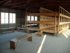 and a communal sleeping area.  The benches were for prisoners to sit on, however, there were so many prisoners in each building, only a few could sit at a time.  This room slept about 60 prisoners.