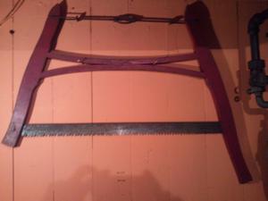 A cross-cut saw, one of the antique wood working tools Uncle Eddy has collected over the years.
