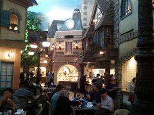 The inside of Le Buffet looks as though you are outside on a Paris street.
