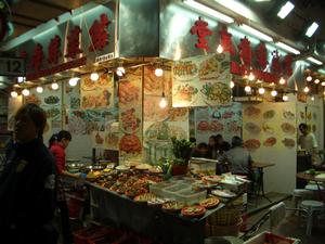 This is an outdoor restaurant.  At night, this street becomes a night market, complete with a restaurant.
