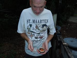 Hey Wayne, look at the camera!</p><p>This is a small geocache.  Inside was a small log book so we could record the "find".
