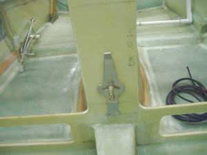 The roll trim is used to relieve the left/right pressure on the control stick.  In this picture, the control lines have not yet been attached.