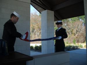 The folding of the flag at the burial service