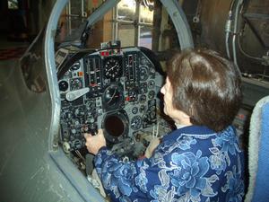 Helen taking the controls of an F105 fighter.