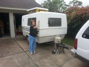 Helen next to "Cassee" her 1969 ten-foot Trails West camper