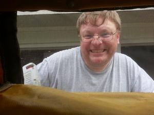 Helen's friend, Tim, helping us to prepare the camper for it's last hurrah before she was sold.
