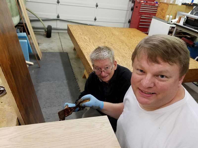 Staining the bed with Tim (on right).