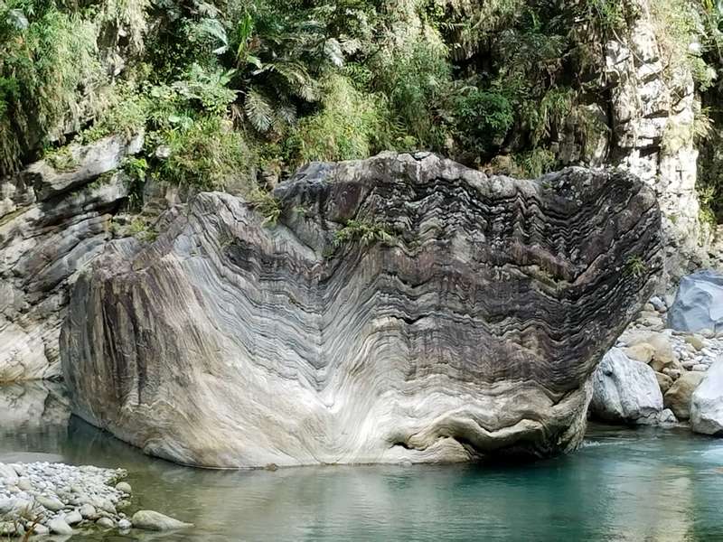 Taroko Gourge has many interesting rock formations.  Most are made of marble, which is made of trillions of sea creatures that have been compressed over billions of years.  These slabs are then uplifted into mountains when tectonic plates crash together.