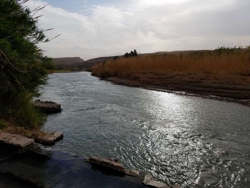 The Rio Grande river runs through the park.  On the other side of the river, is Mexico.