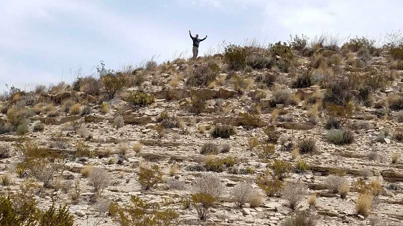 All during our trip, we were climbing up and down many hills.  Charles is rejoicing at having reached the top of a steep hill!