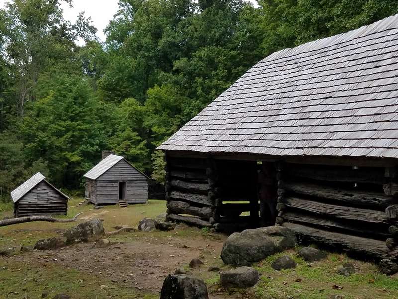 This is a collection of farm buildings in Cade's Cove.  Notice the distance between each building.  This was to prevent a fire in one building from spreading to the others.