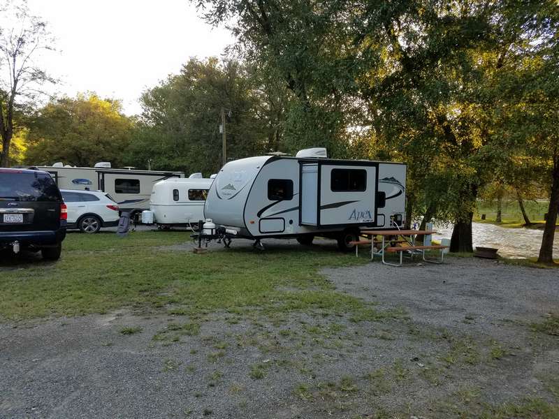 The other side of the travel trailer showing the dining table slide out.