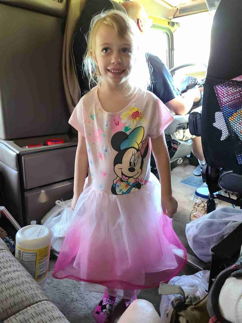 Helena inside Katie's cab