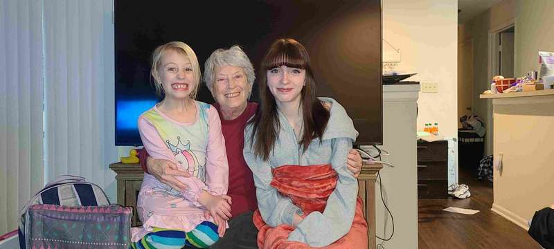 Grandma Helen with two of her five grandkids, Helena (left) and Reghan (right)