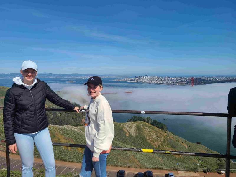 Marveling at the great views from the top of Hawk Hill.