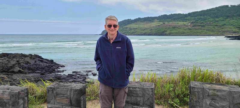 Were on Jeju in early June.  Notice the jacket I am wearing as it was chilly.  The peak season is July, about a month away.