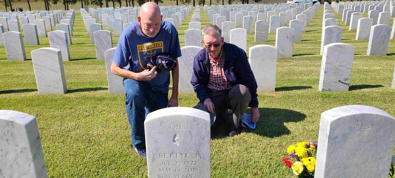Service men are only allowed one gravesite, so, since my Mom passed first, she is on the bottom and our Dad's urn was placed on top.  If you click on the picture, you'll see that Wayne and Charles are facing our Dad's (front) side of the grave stone.