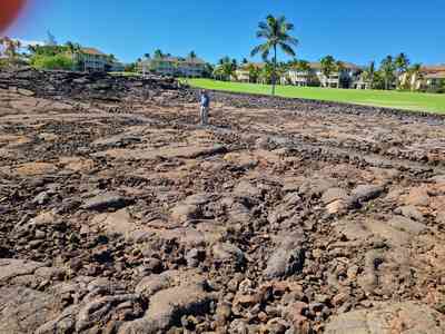 On the trail hunting for ancient Hawaiian petroglyphs.
