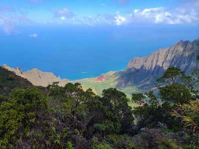 The vibrant red and emerald expanses of Waimea Canyon on Kauai.