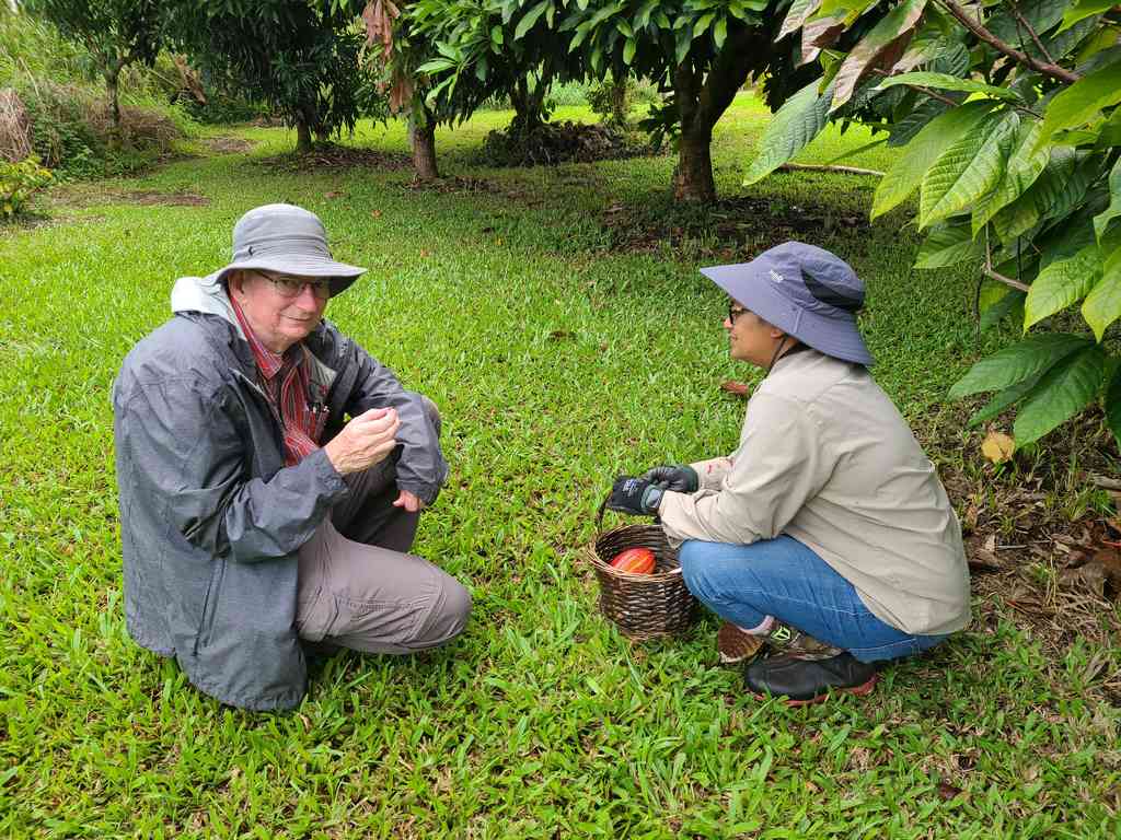 Milar treating Charles to some fresh fruit tasting.