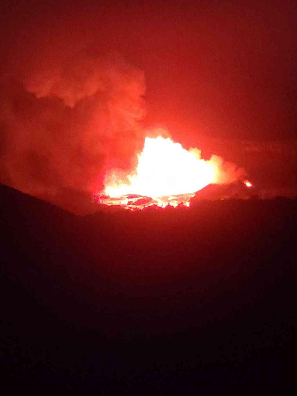 Kilauea illuminating the night sky.