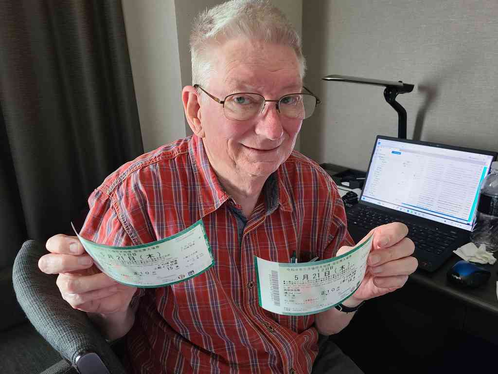 Charles thrilled to collect our tickets from 7-Eleven.