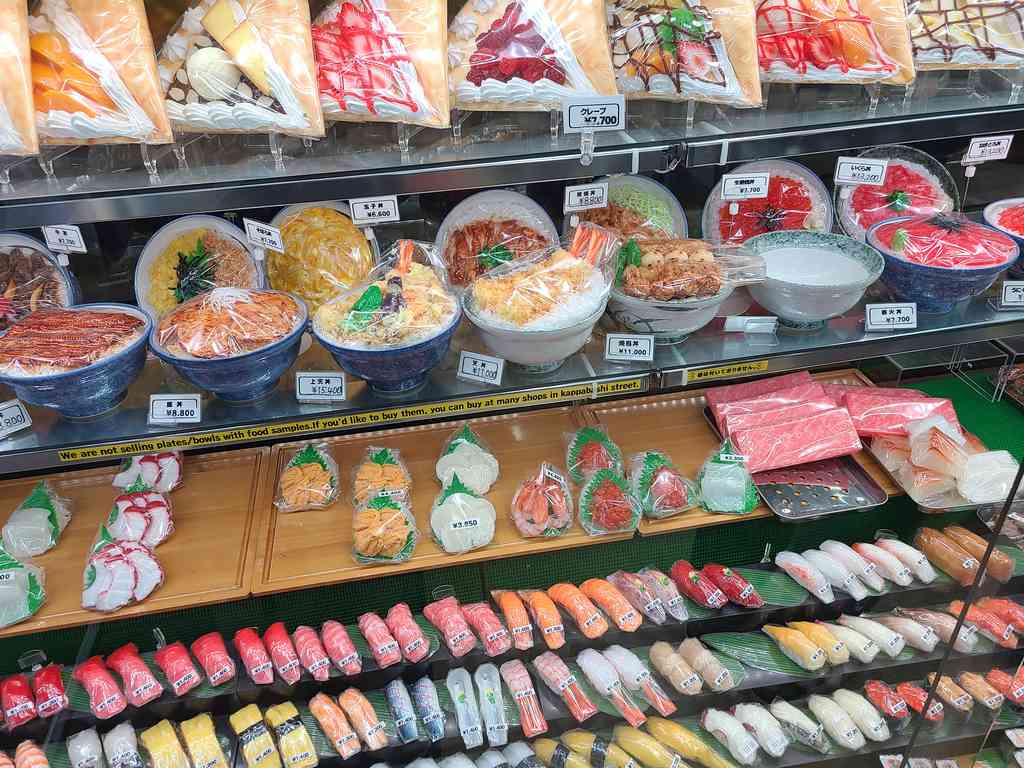 Hyper-realistic plastic food displays.