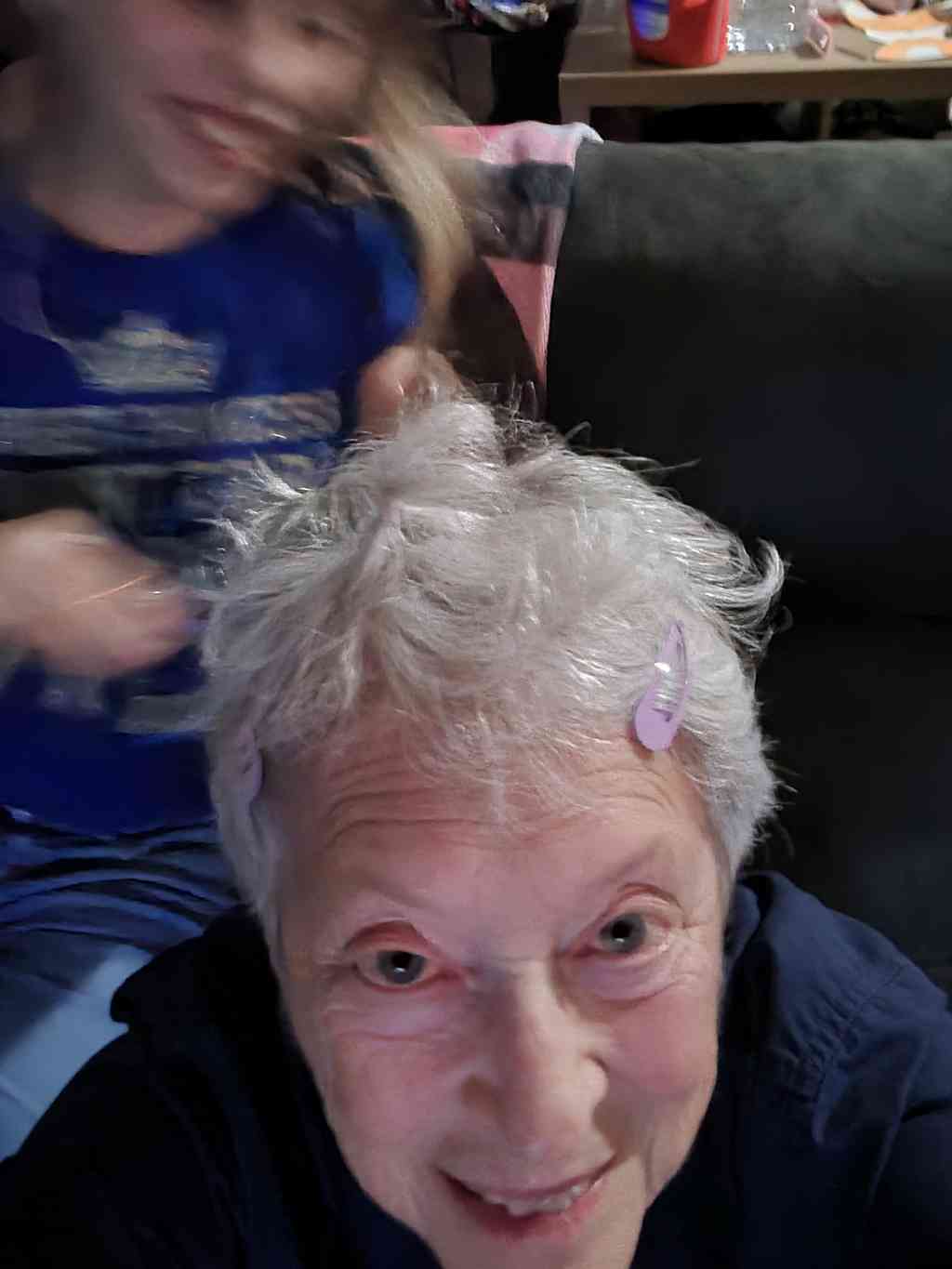 Grandma Helen getting her hair styled by Helena.