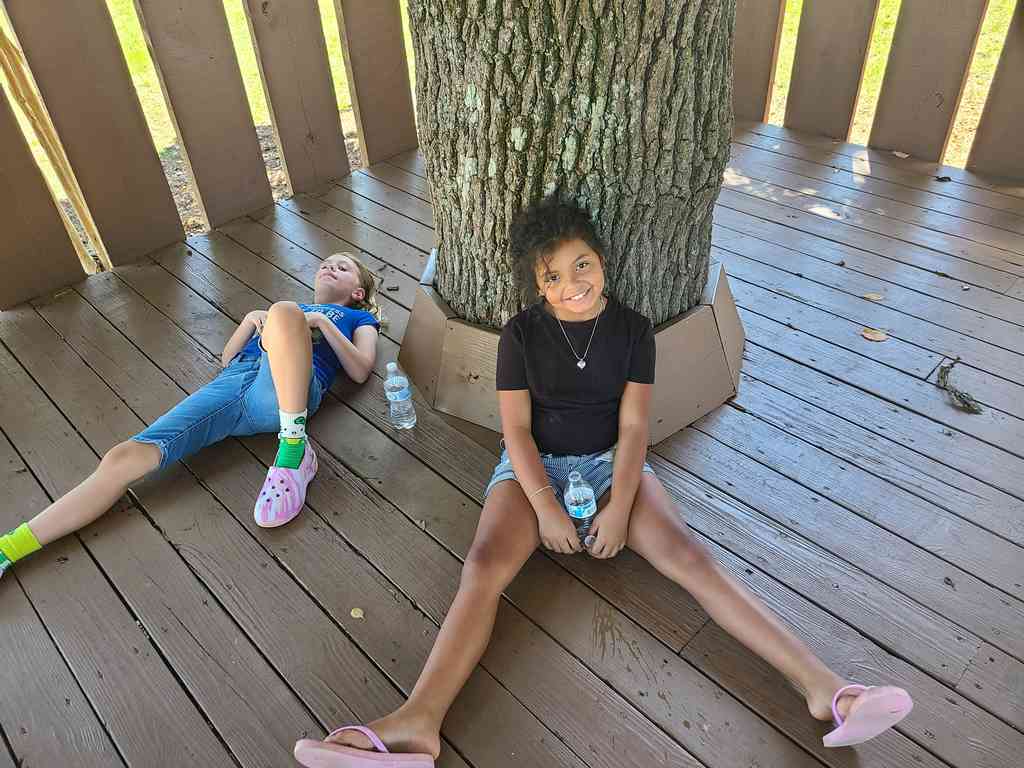 Playground break with friend Demi.