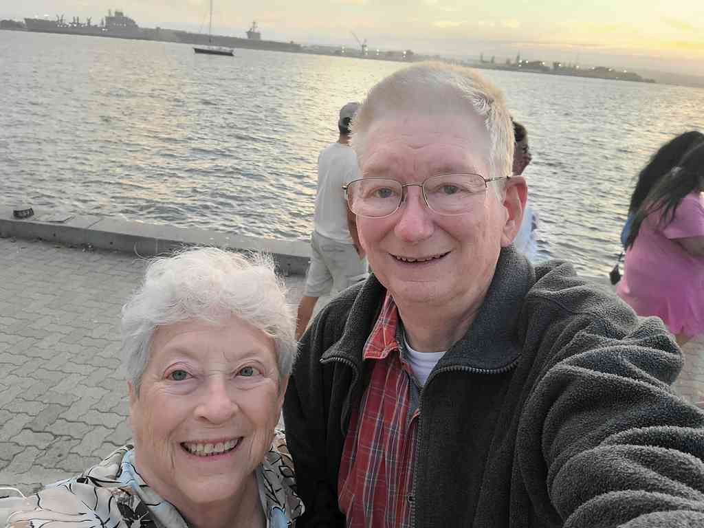 Enjoying the warm afternoon sun on the waterfront.